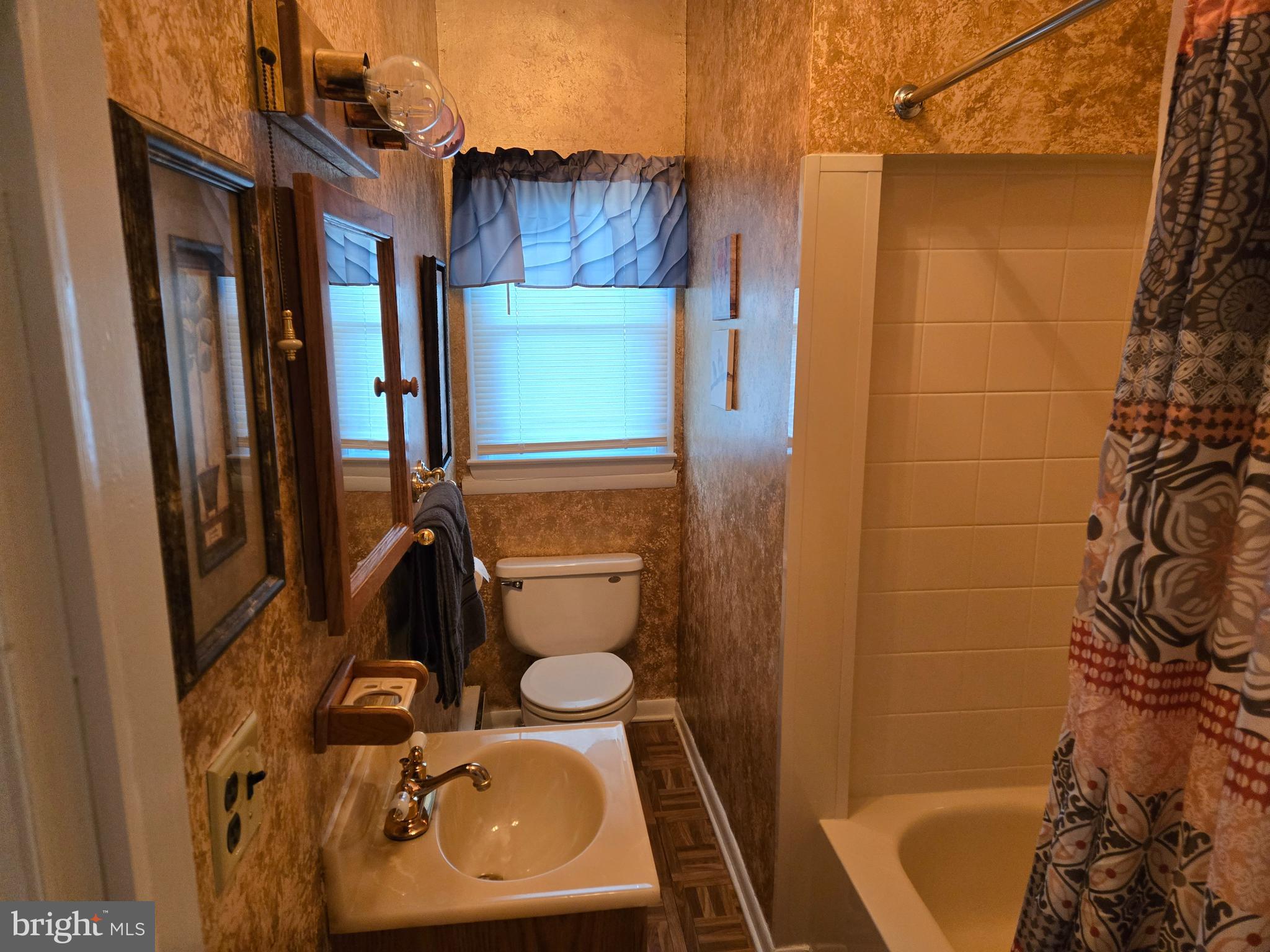 2414 Willoughby Beach Road Edgewood, MD 21040 - Photo 26 of 35 a bathroom with a sink toilet and shower