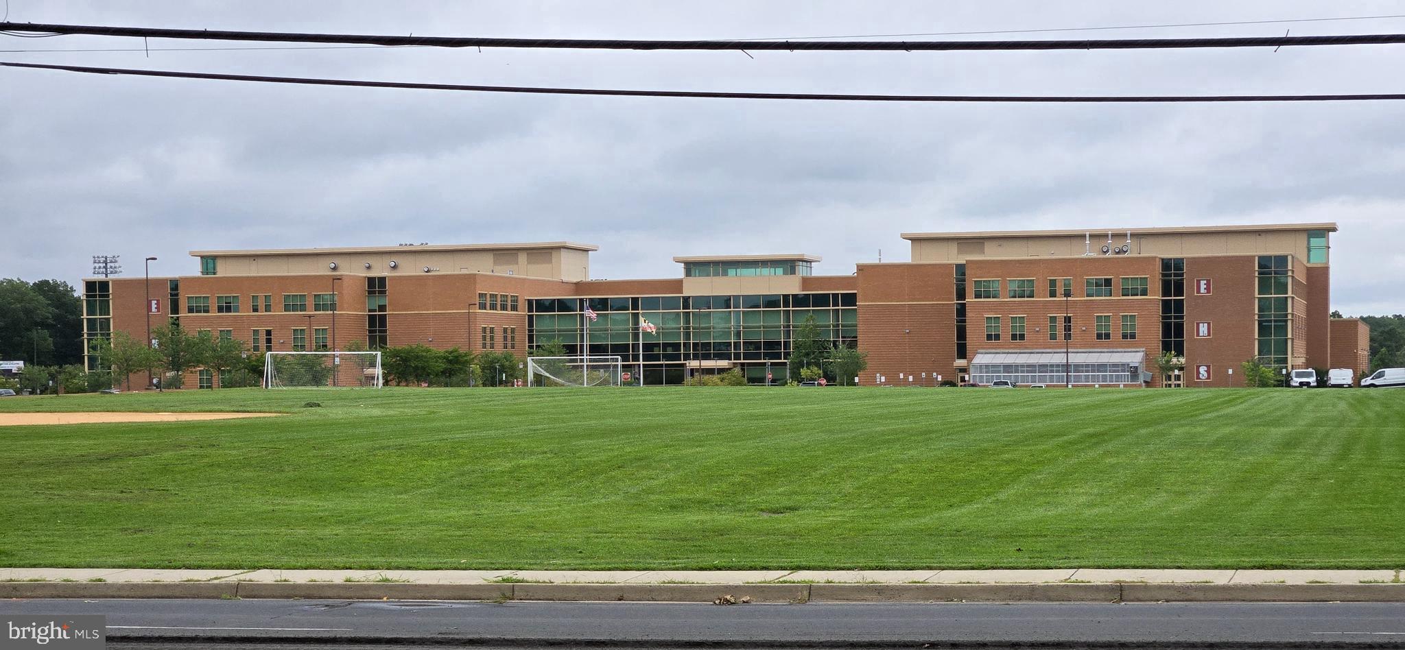 2414 Willoughby Beach Road Edgewood, MD 21040 - Photo 34 of 35 a view of a big house with a big yard and large trees