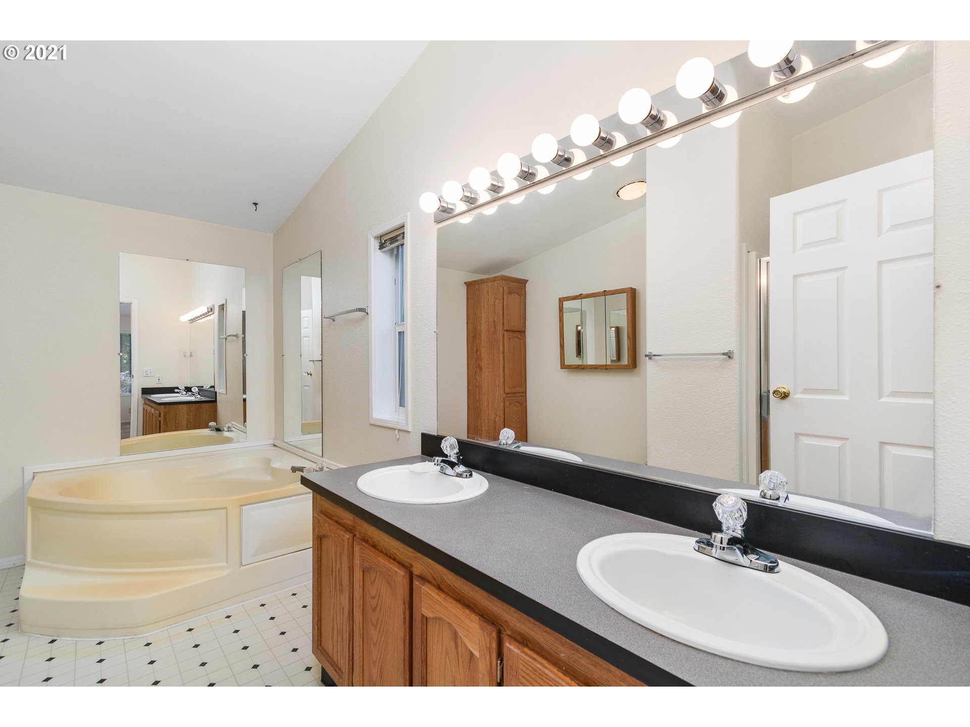 75367 Fern Hill Road Rainier, OR 97048 - Photo 14 of 27 a bathroom with a sink double vanity granite and a mirror