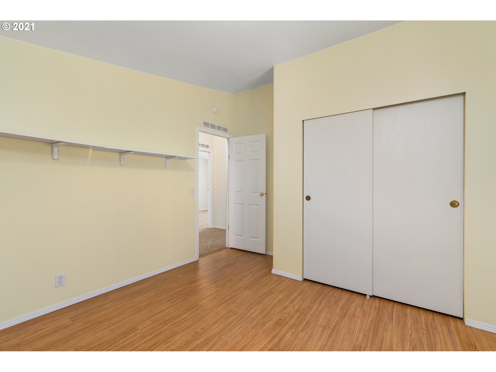 75367 Fern Hill Road Rainier, OR 97048 - Photo 20 of 27 a view of an empty room with wooden floor