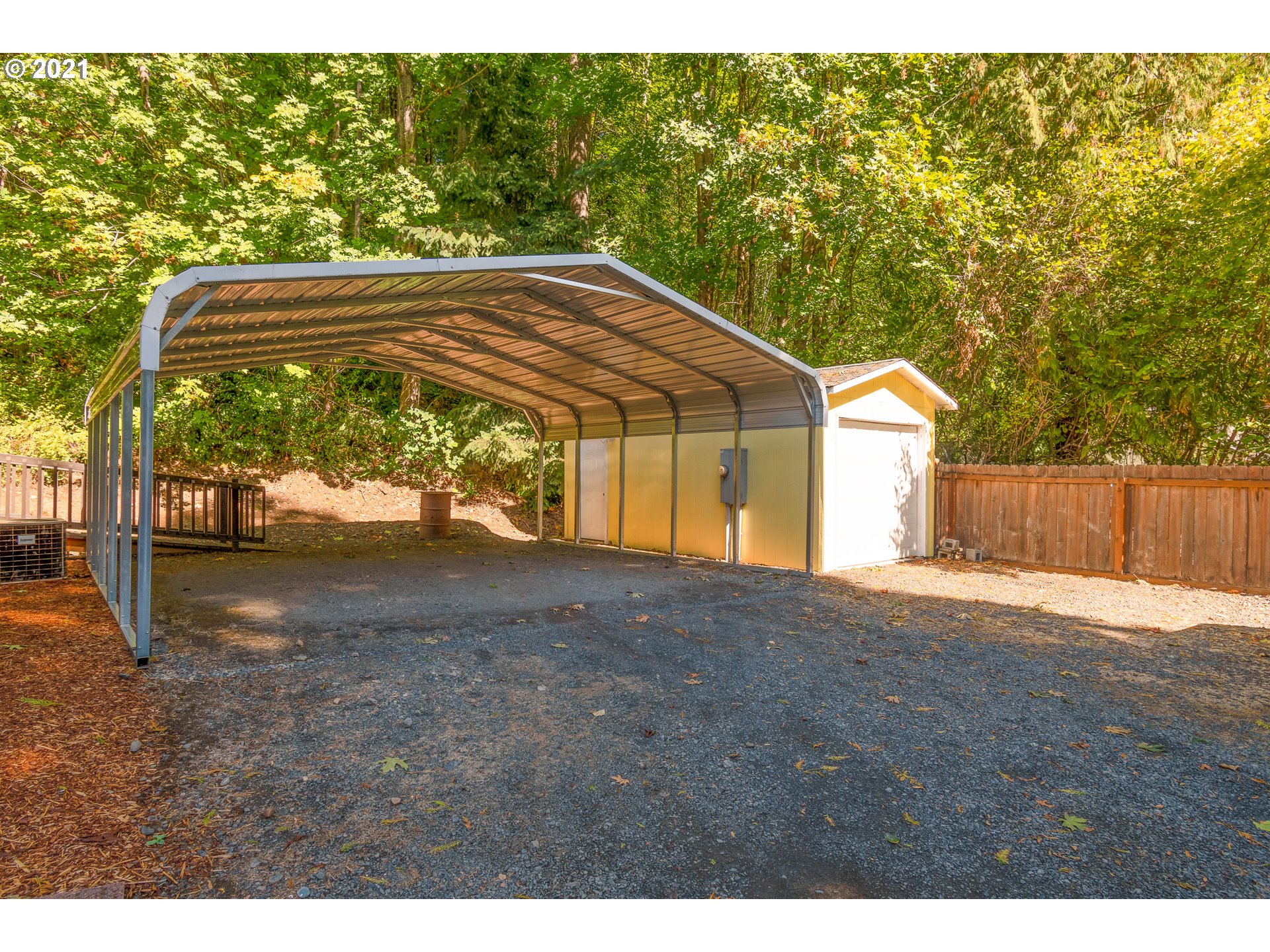 75367 Fern Hill Road Rainier, OR 97048 - Photo 3 of 27 a view of a house with backyard and trees