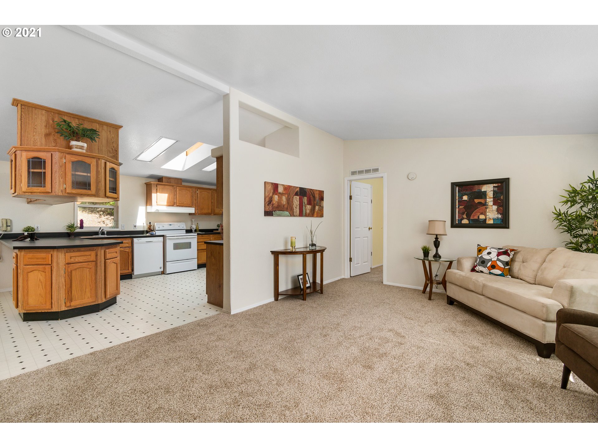 75367 Fern Hill Road Rainier, OR 97048 - Photo 5 of 27 a living room with furniture and kitchen view