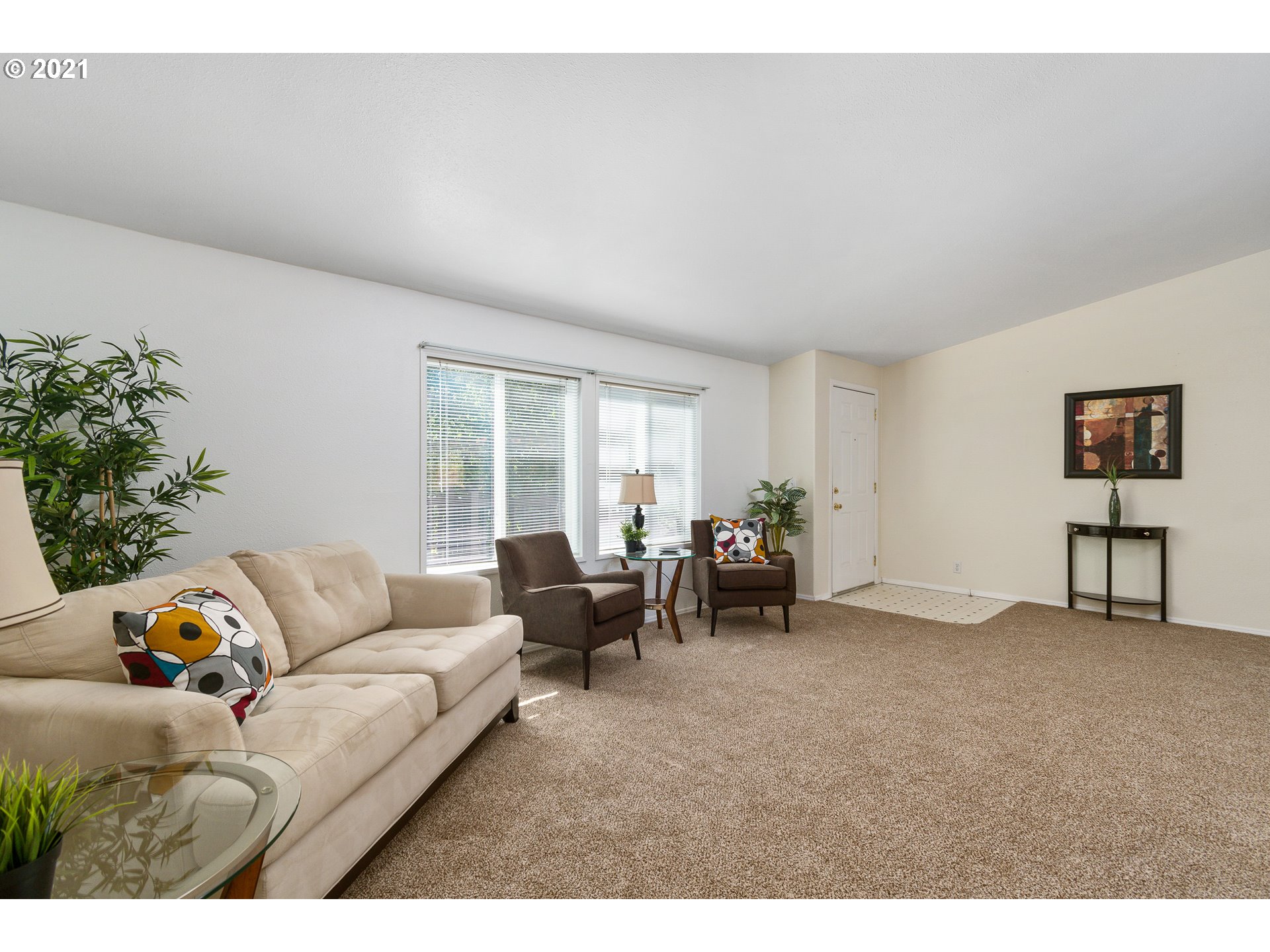 75367 Fern Hill Road Rainier, OR 97048 - Photo 7 of 27 a living room with furniture and a potted plant