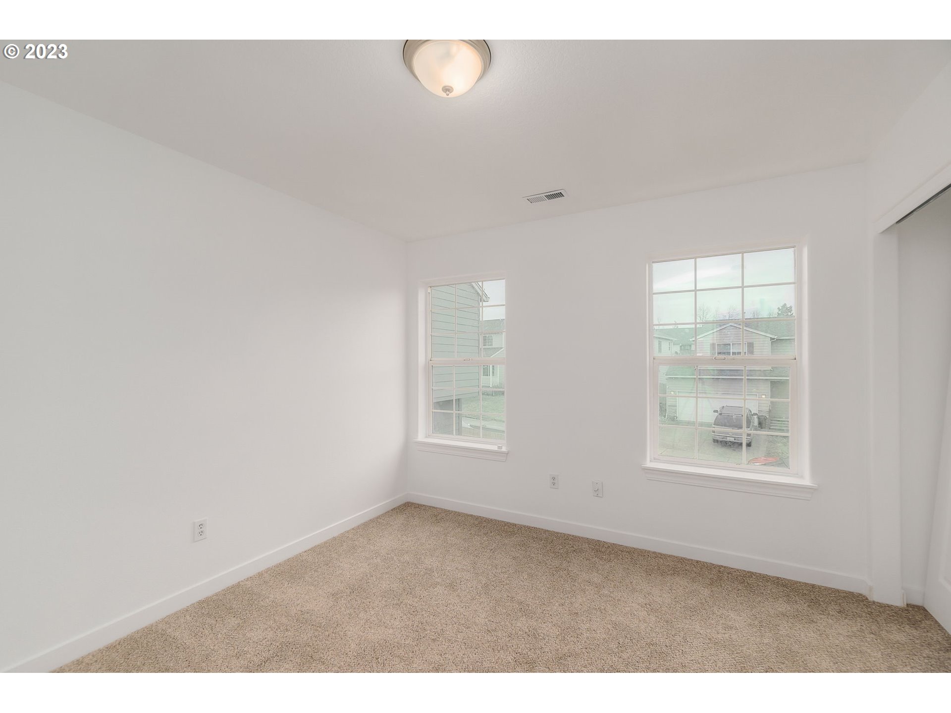 16506 Northeast 14th Avenue Ridgefield, WA 98642 - Photo 21 of 24 a view of an empty room with a window