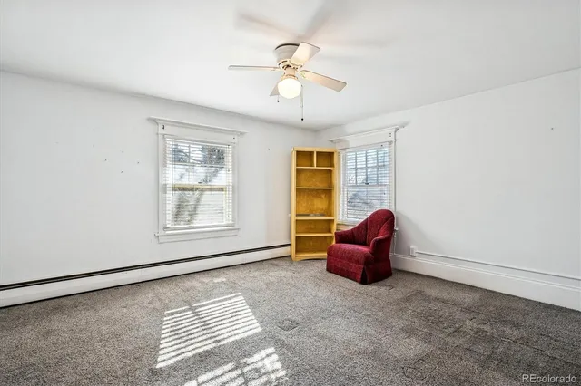 a room with gym equipment and a window