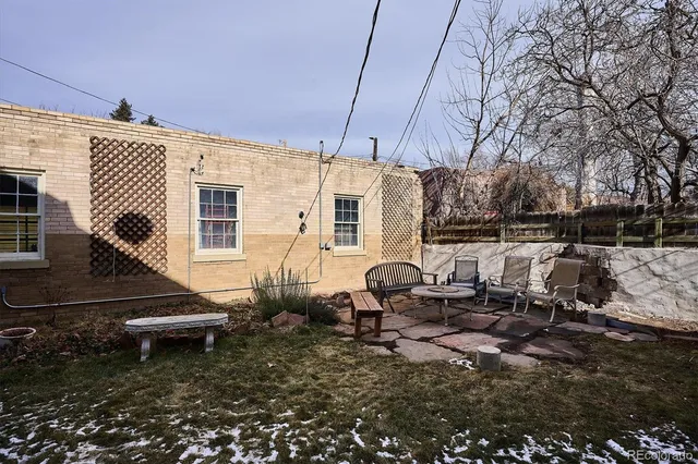 a view of a building with sitting area