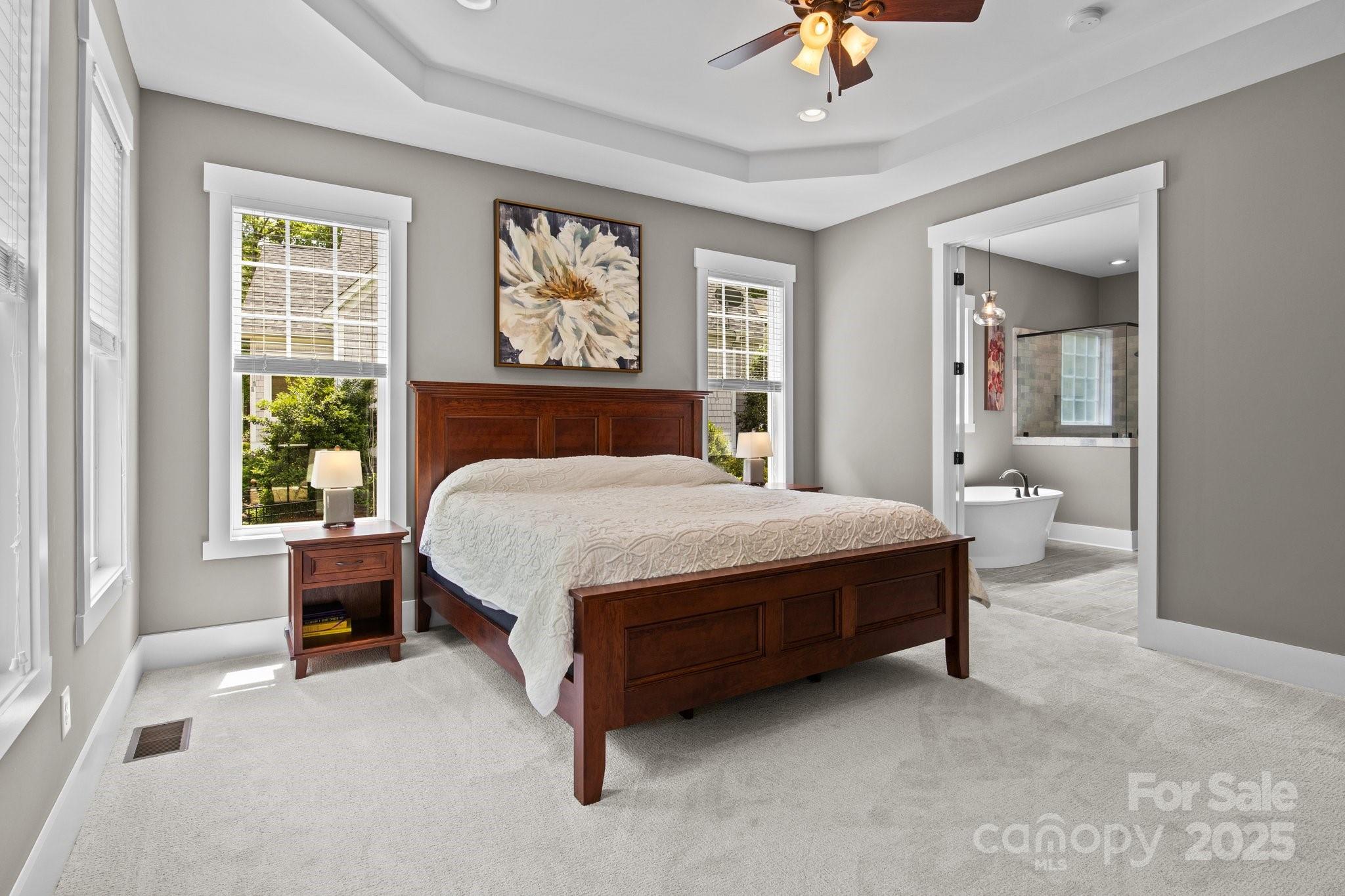 6743 Fox Ridge Circle Davidson, NC 28036 - Photo 24 of 48 a bed sitting in a bedroom next to a window