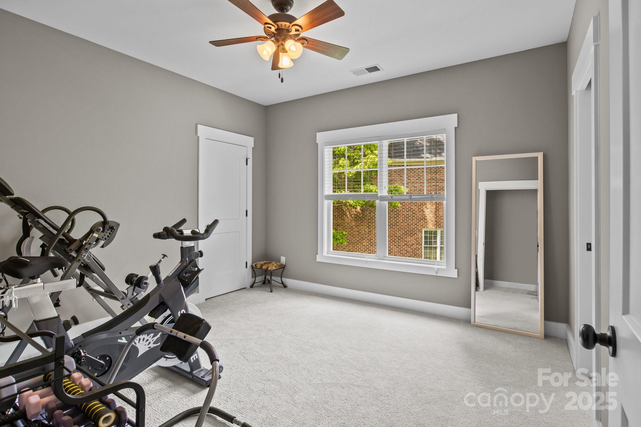 6743 Fox Ridge Circle Davidson, NC 28036 - Photo 30 of 48 a view of a room with gym equipment