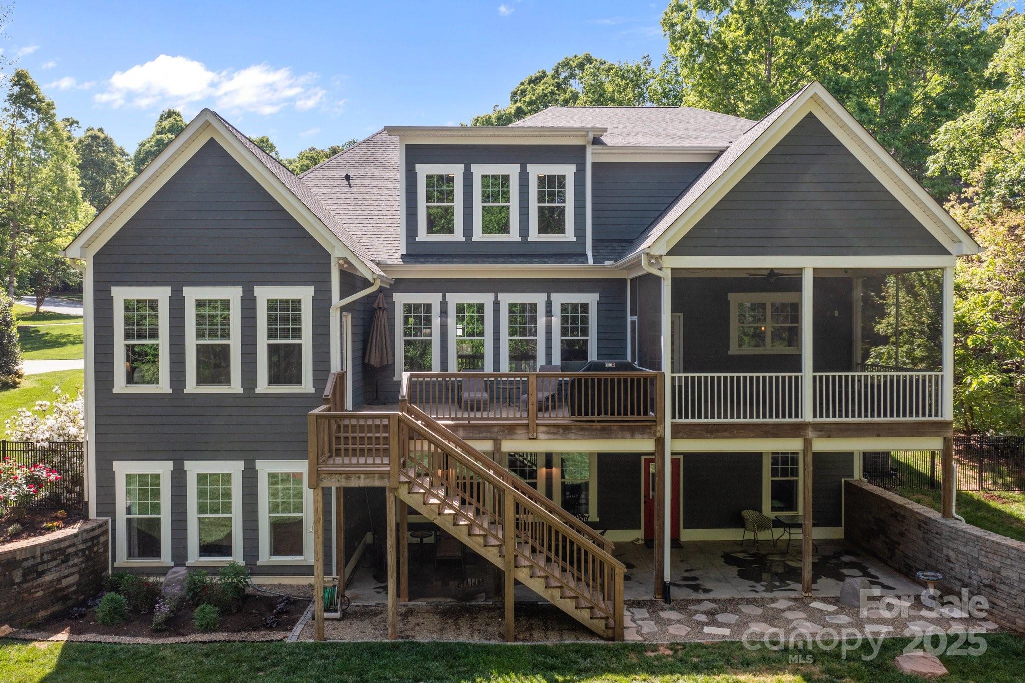 6743 Fox Ridge Circle Davidson, NC 28036 - Photo 43 of 48 a front view of a house with a yard