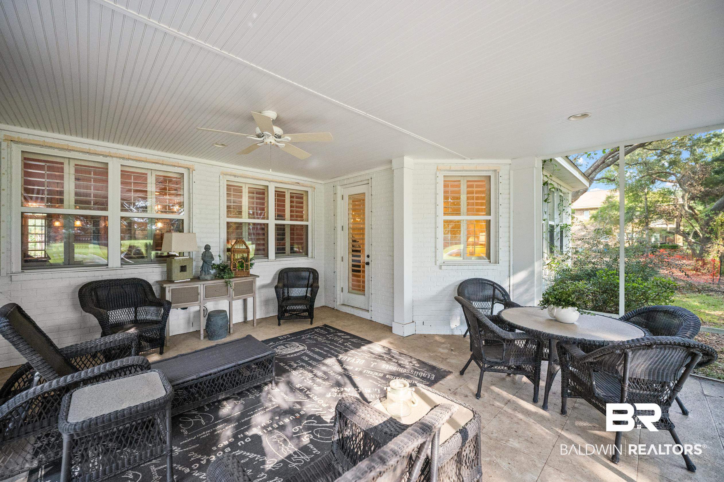 404 Peninsula Boulevard Gulf Shores, AL 36542 - Photo 34 of 51 View of patio featuring ceiling fan, outdoor dining area, and outdoor lounge area