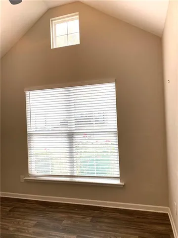 a view of a room that has a window in it