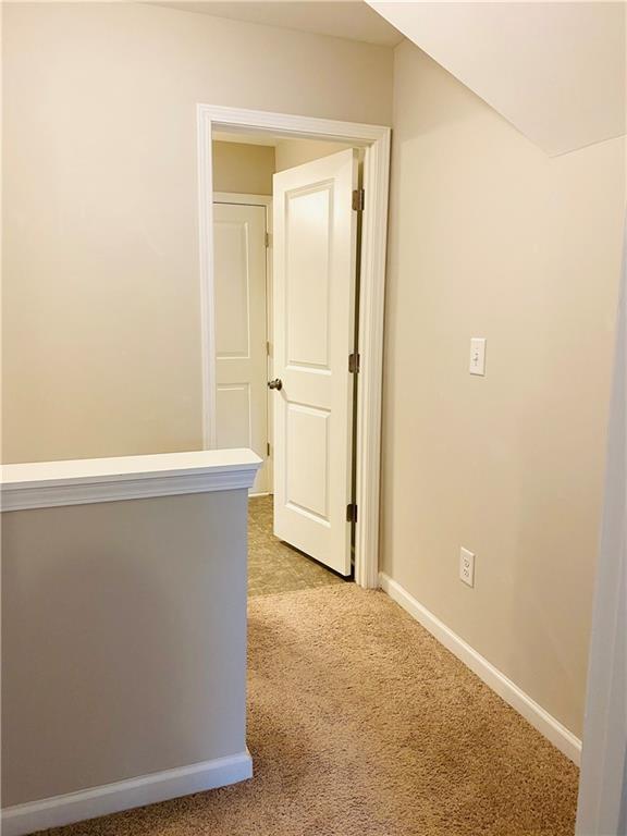 66 Wisteria Way Winder, GA 30680 - Photo 24 of 34 an empty room with wooden door