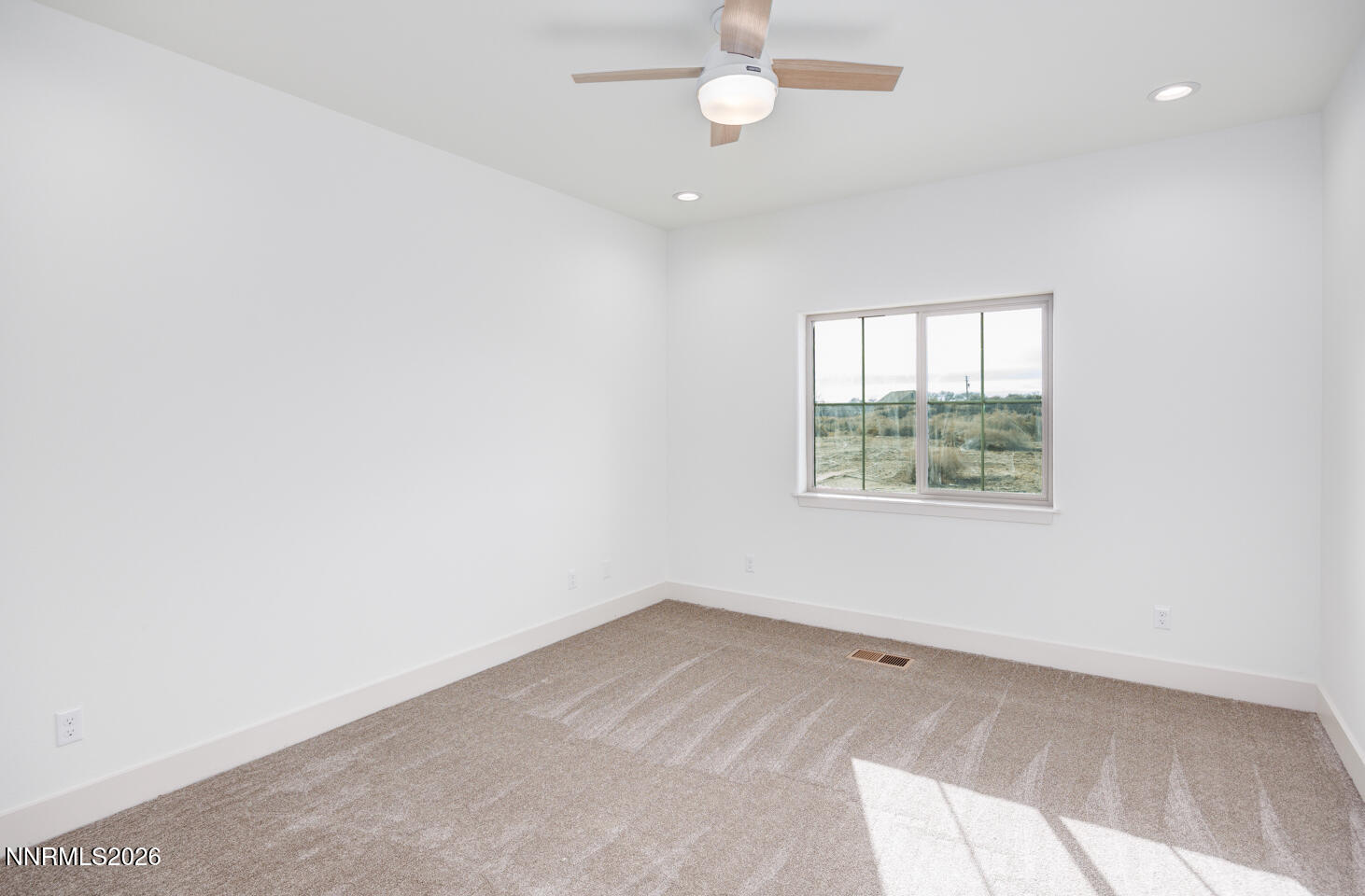 1150 Jungle Drive Fallon, NV 89406 - Photo 14 of 30 an empty room with a window
