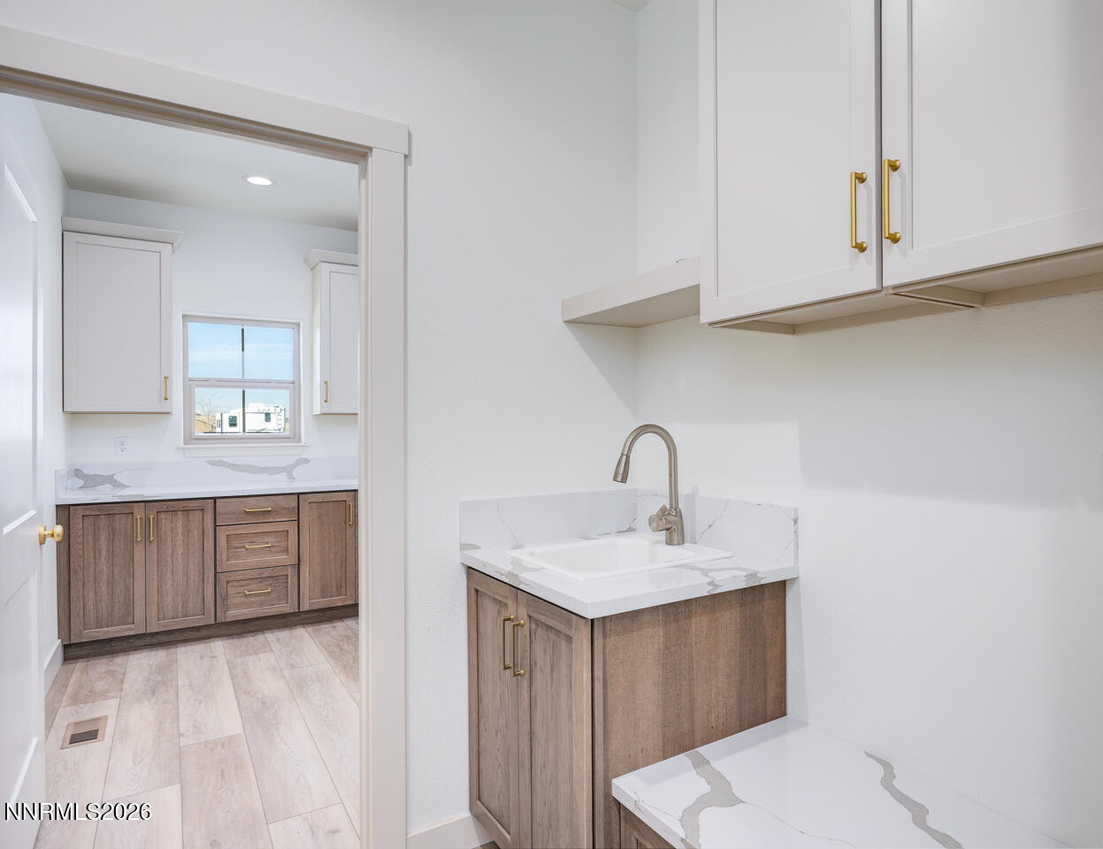 1150 Jungle Drive Fallon, NV 89406 - Photo 16 of 30 a bathroom with a sink vanity and mirror
