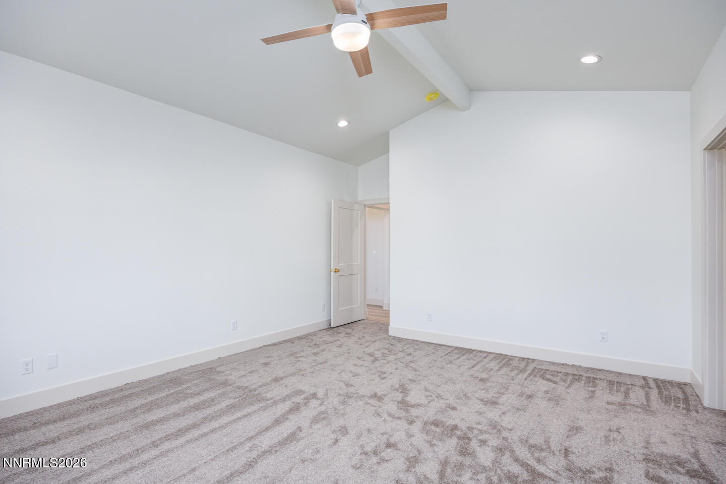 1150 Jungle Drive Fallon, NV 89406 - Photo 19 of 30 an empty room with a ceiling fan and window