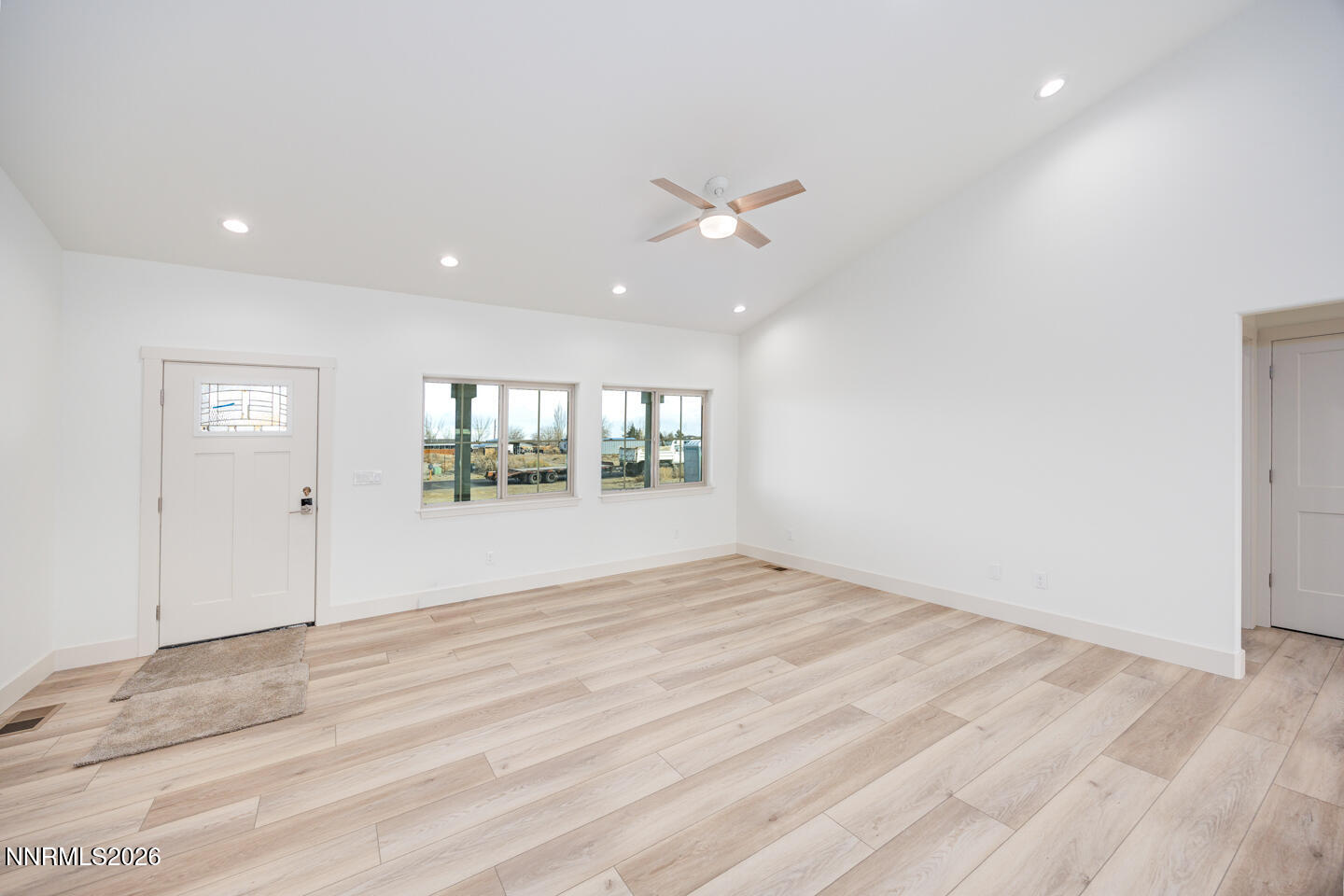 1150 Jungle Drive Fallon, NV 89406 - Photo 2 of 30 an empty room with fan and windows