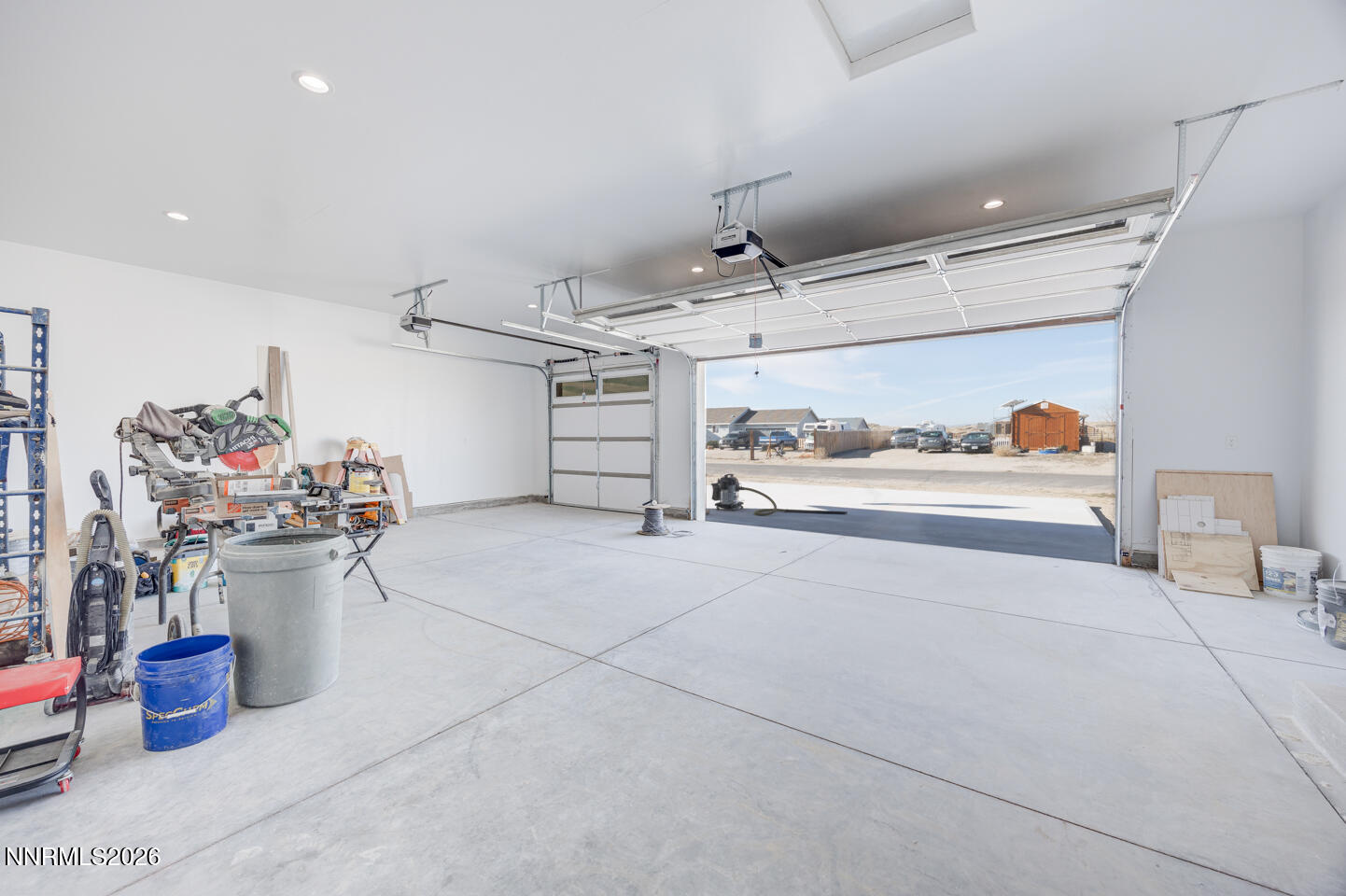 1150 Jungle Drive Fallon, NV 89406 - Photo 24 of 30 a utility room with lots of clutter and cabinets
