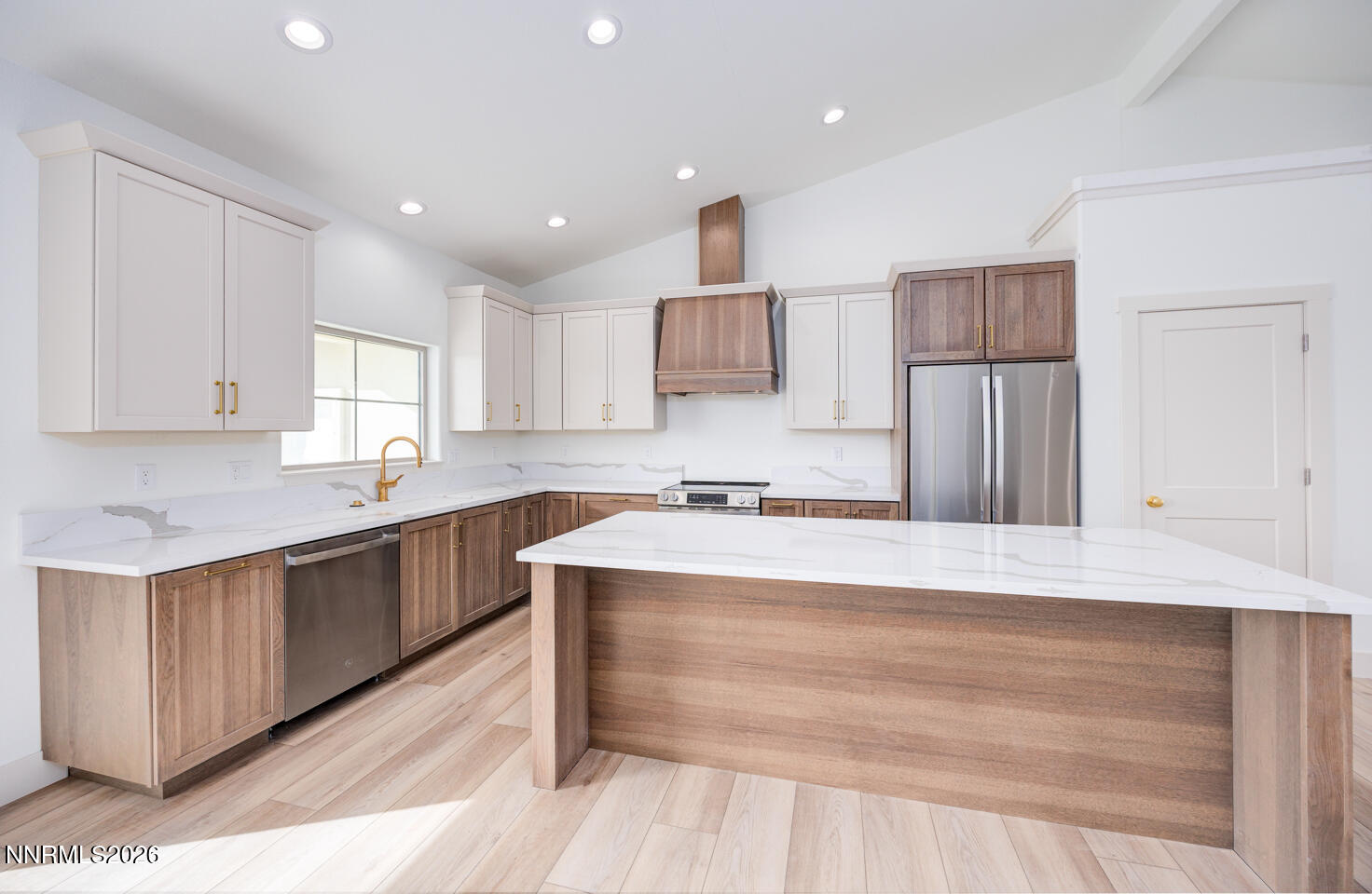 1150 Jungle Drive Fallon, NV 89406 - Photo 5 of 30 a kitchen with kitchen island a sink stainless steel appliances and cabinets