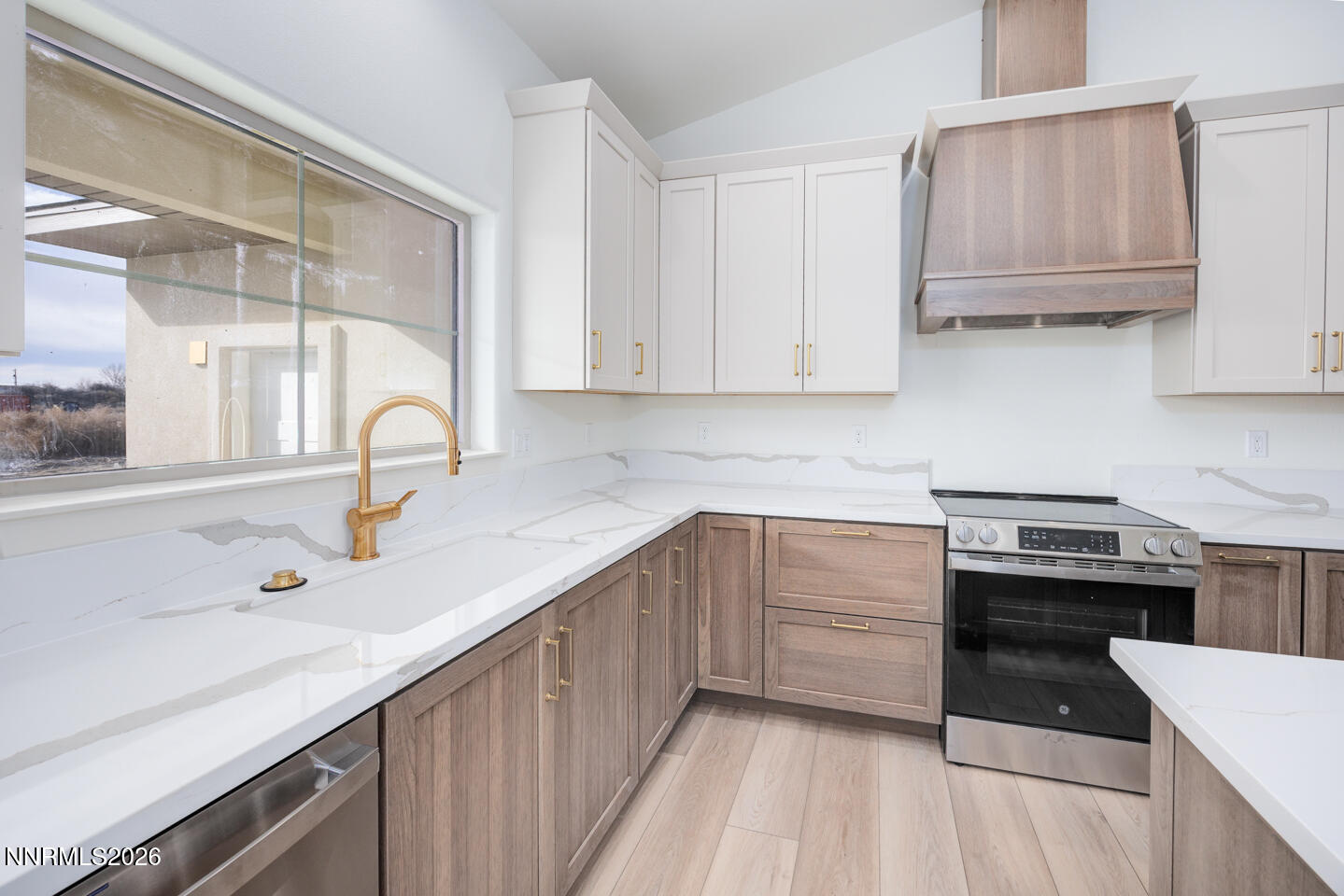 1150 Jungle Drive Fallon, NV 89406 - Photo 6 of 30 a kitchen with a sink and cabinets
