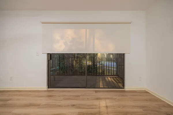 a view of a wooden floor in a room