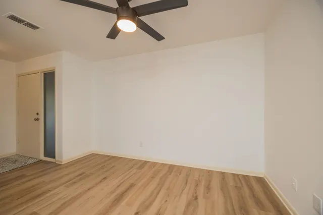 a view of a kitchen with a potted plant