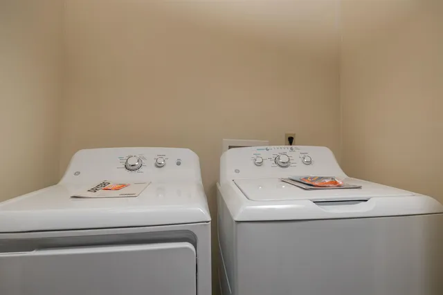 a view of an outdoor space and tennis court