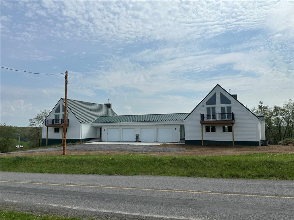 1121 Three Degree Road Butler, PA 16002 - Photo 1 of 28 a house that has a tree in front of it