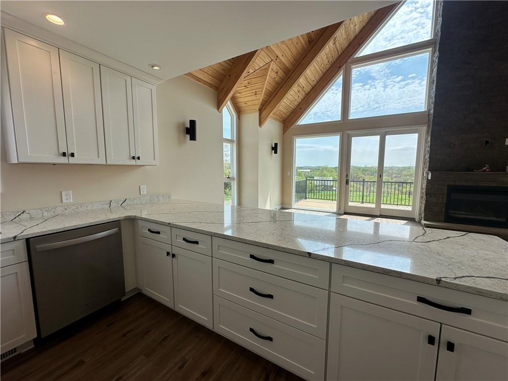 1121 Three Degree Road Butler, PA 16002 - Photo 15 of 28 a kitchen with granite countertop white cabinets and a large window
