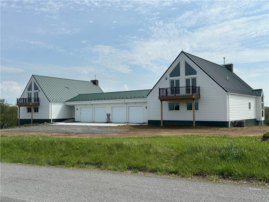 1121 Three Degree Road Butler, PA 16002 - Photo 2 of 28 a front view of house with yard and green space