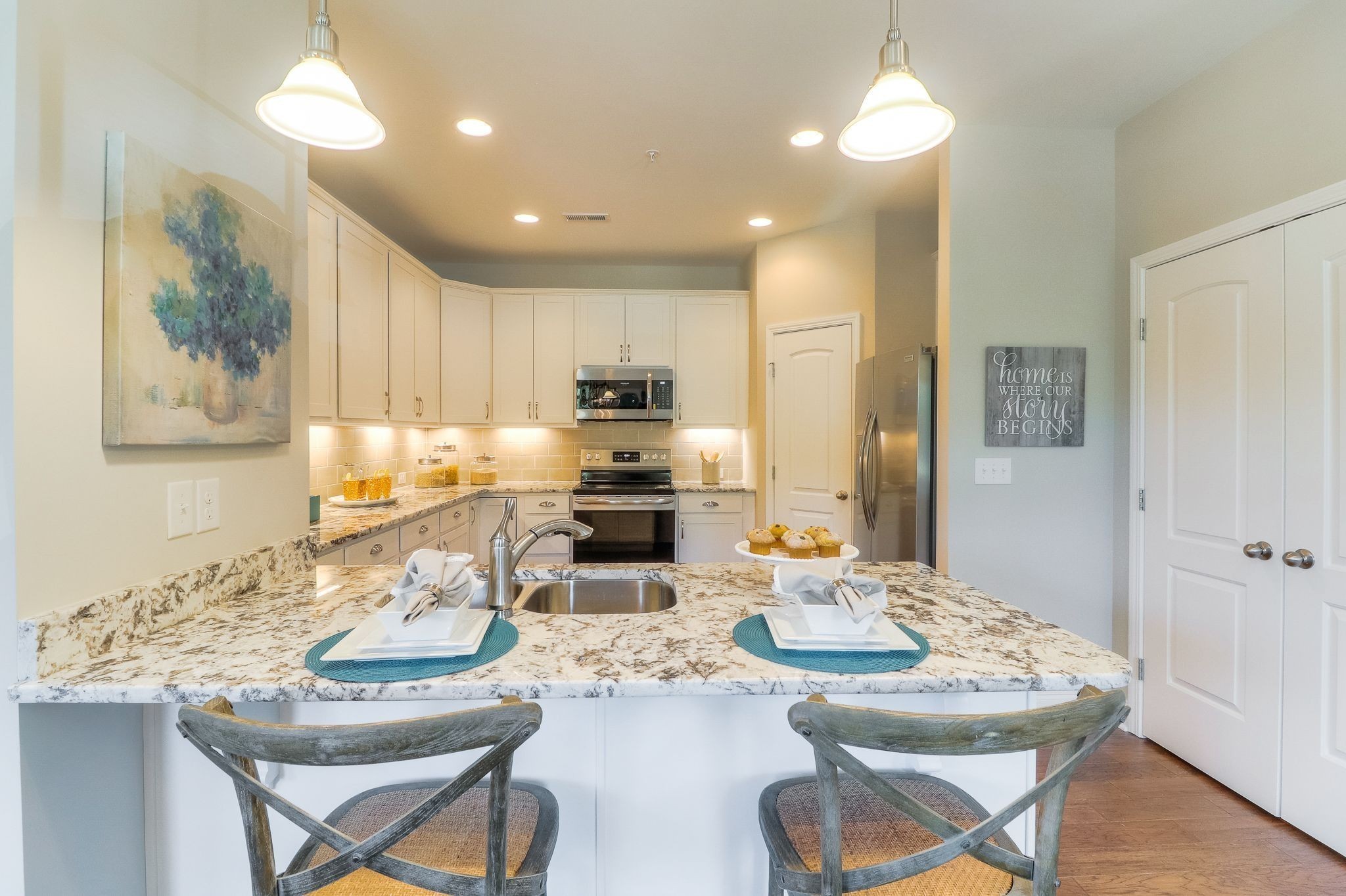 334 Buckner Cir Mount Mount Juliet, TN 37122 - Photo 11 of 40 a kitchen with kitchen island granite countertop furniture and a dining table