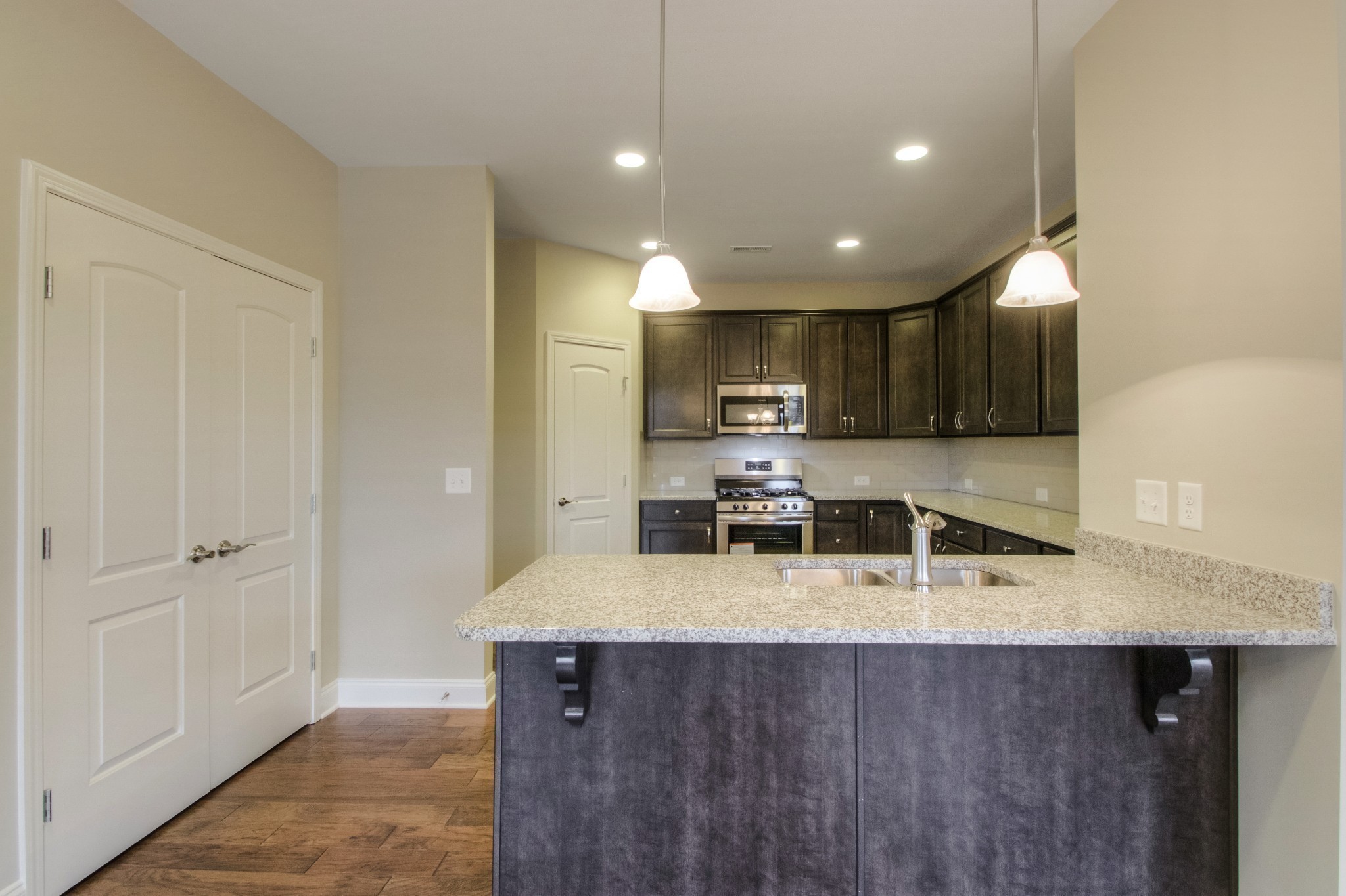 334 Buckner Cir Mount Mount Juliet, TN 37122 - Photo 12 of 40 a kitchen with a sink a counter space appliances and cabinets