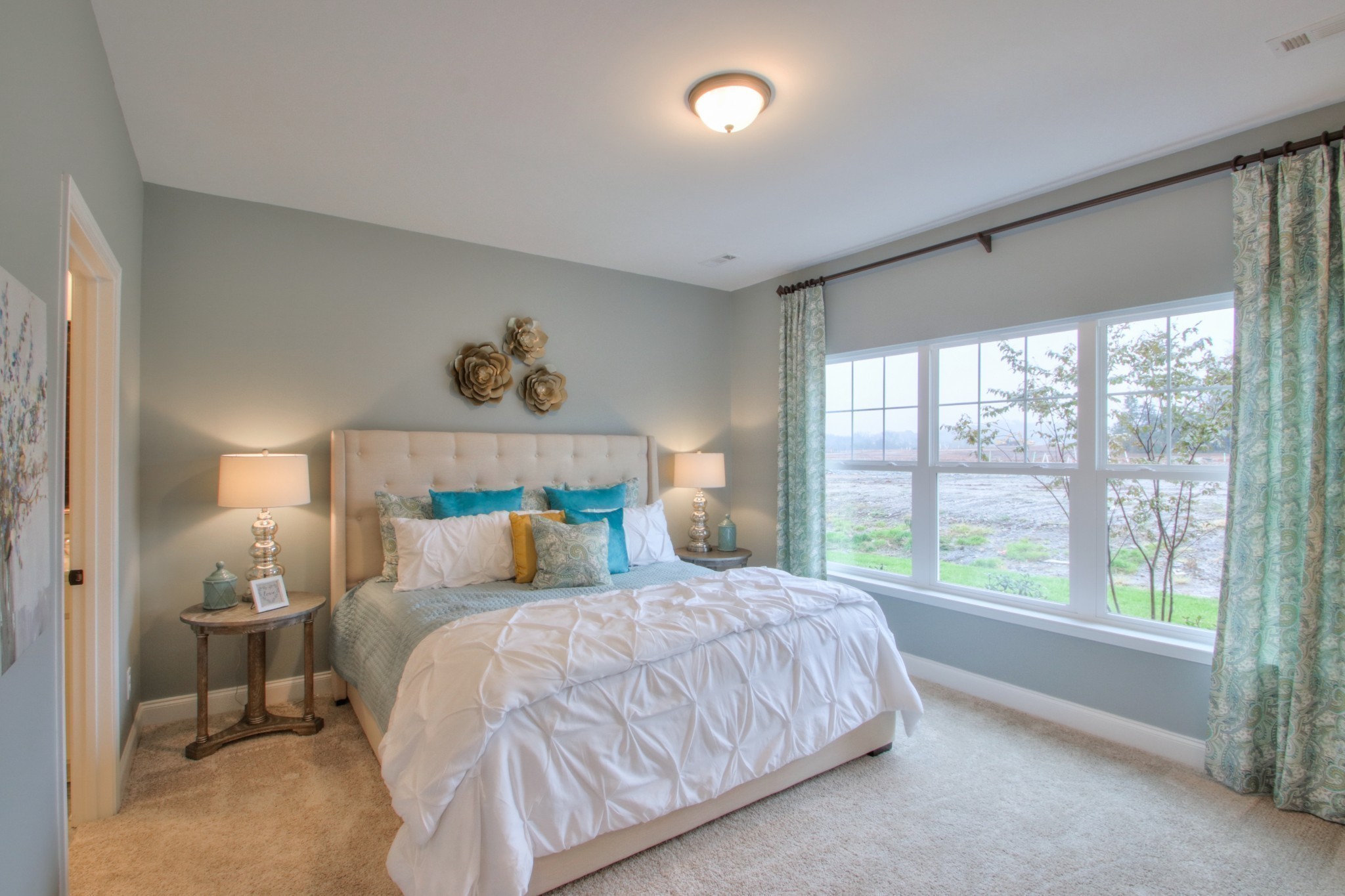 334 Buckner Cir Mount Mount Juliet, TN 37122 - Photo 18 of 40 a bedroom with a bed and a large window