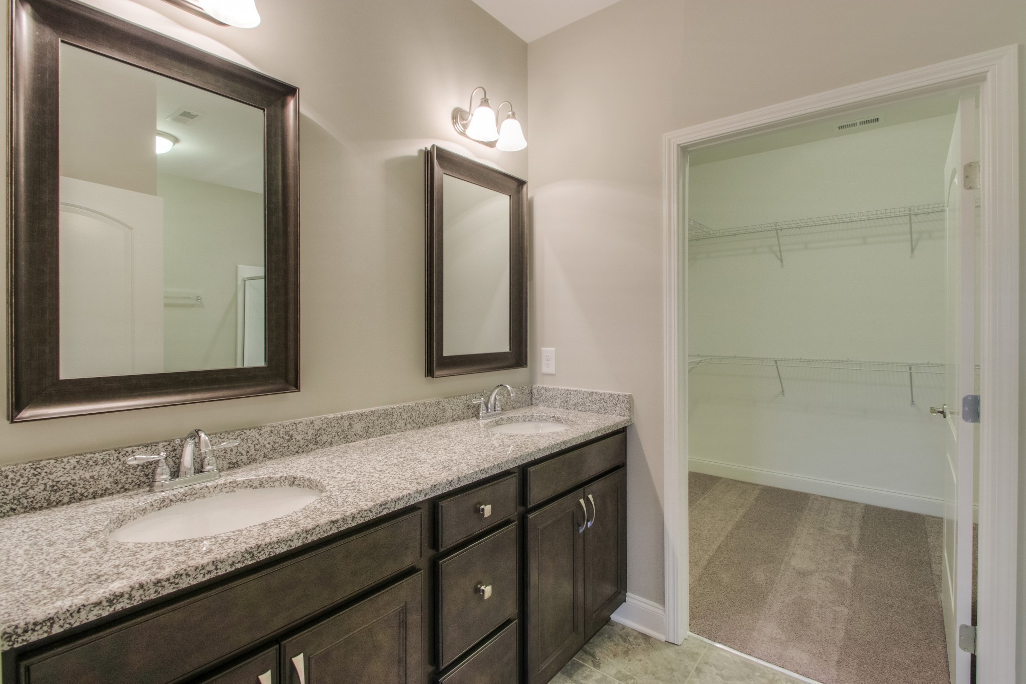 334 Buckner Cir Mount Mount Juliet, TN 37122 - Photo 20 of 40 a bathroom with a granite countertop sink and a mirror