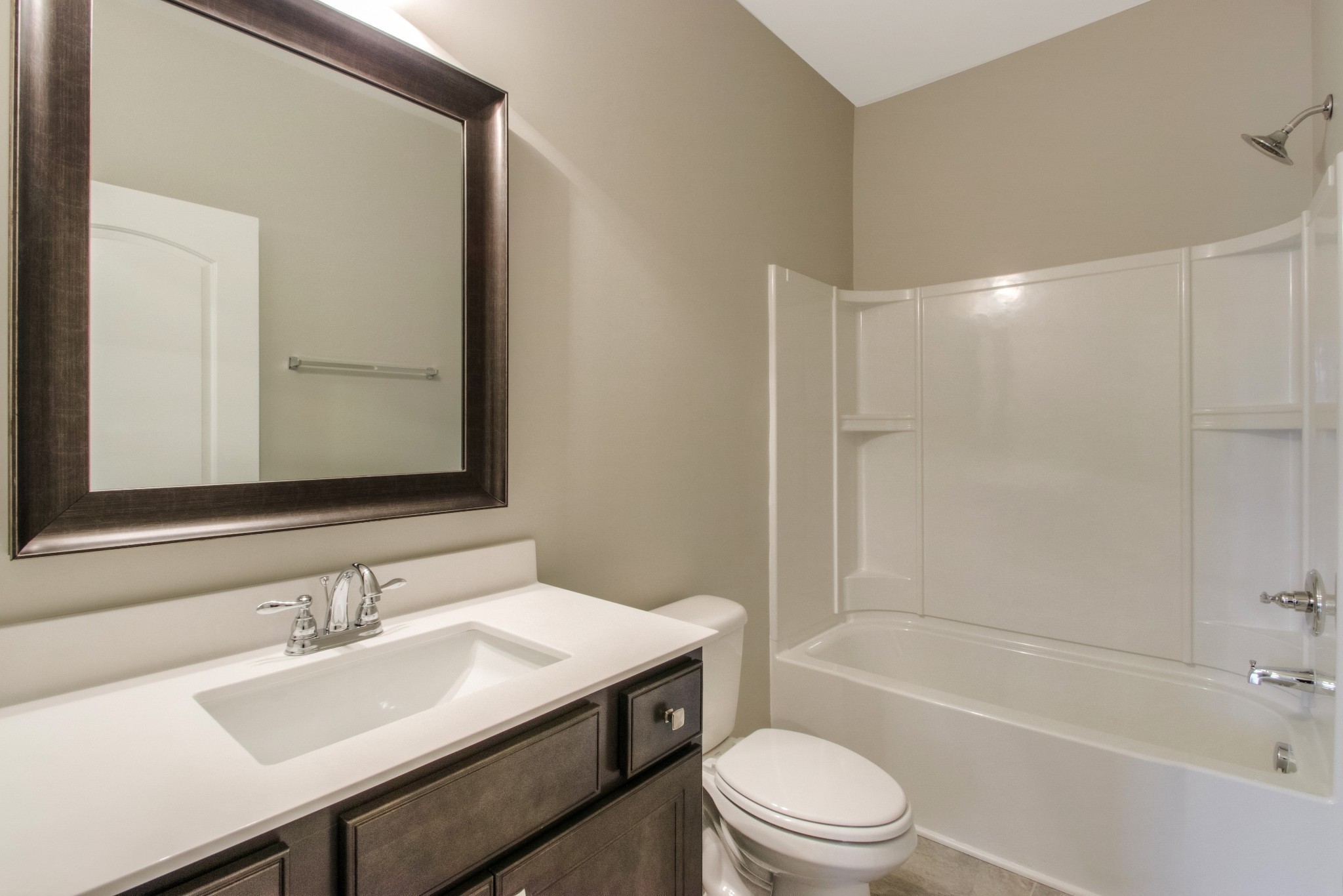 334 Buckner Cir Mount Mount Juliet, TN 37122 - Photo 26 of 40 a bathroom with a bathtub shower sink vanity mirror and toilet