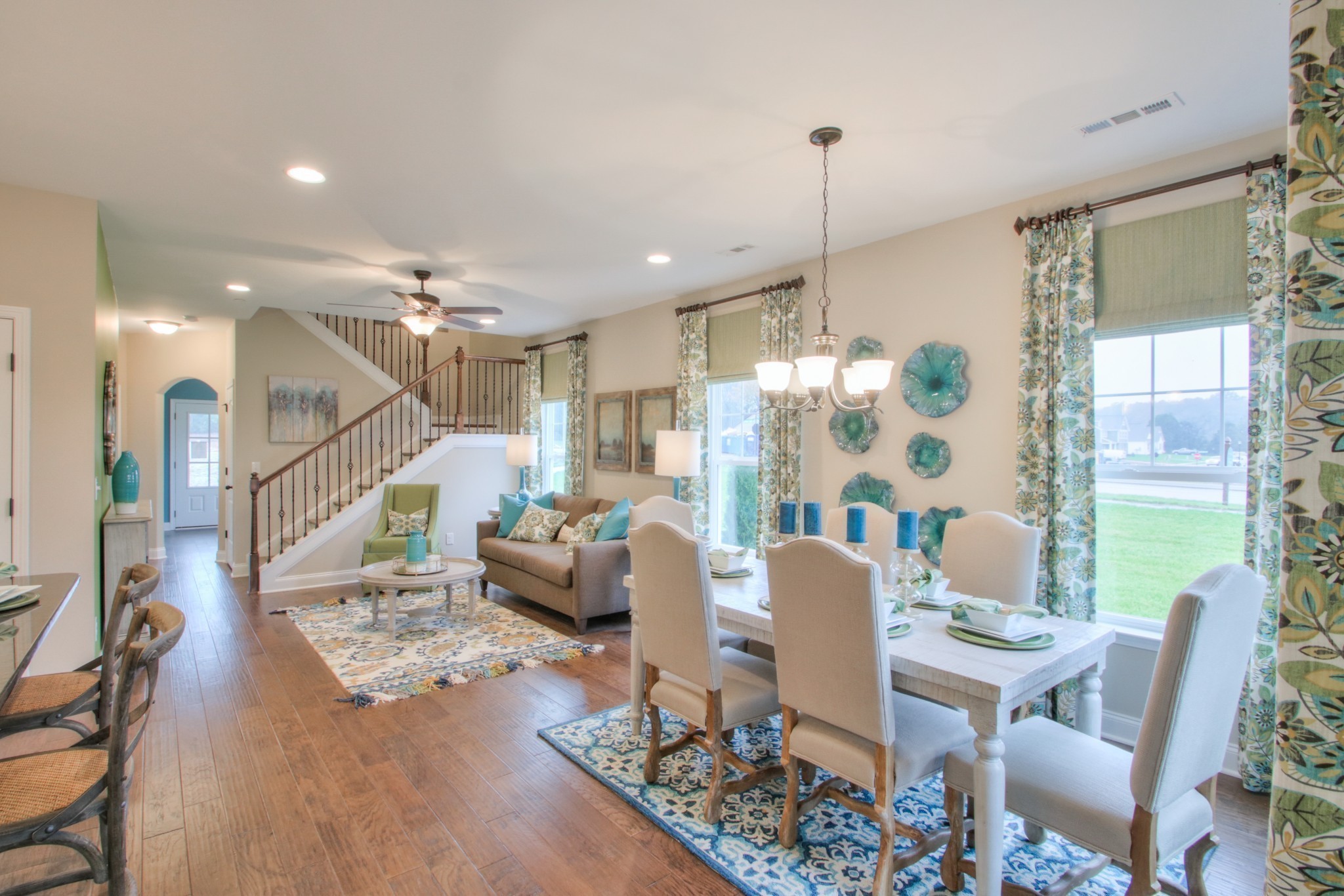 334 Buckner Cir Mount Mount Juliet, TN 37122 - Photo 7 of 40 a living room with furniture and a chandelier