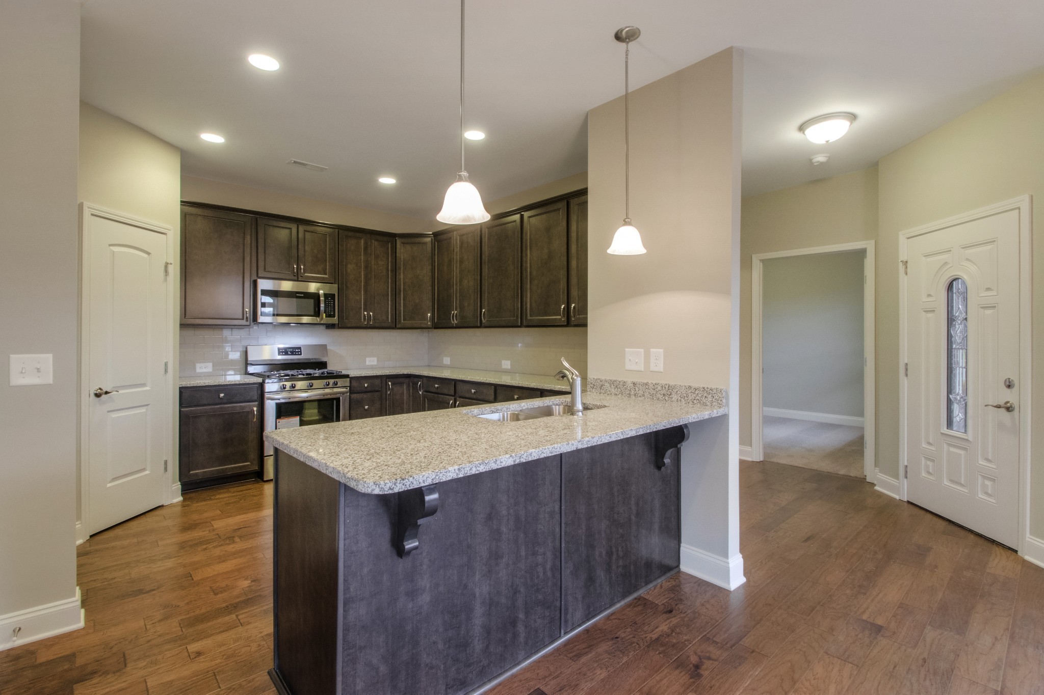 334 Buckner Cir Mount Mount Juliet, TN 37122 - Photo 10 of 40 a kitchen with a sink a stove a refrigerator and a oven
