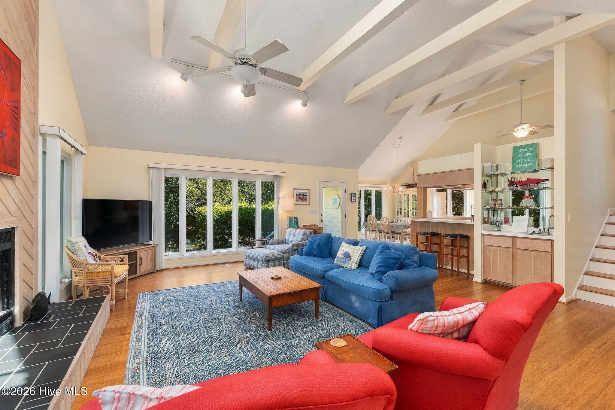 579 Coral Ridge Road Pine Knoll Shores, NC 28512 - Photo 10 of 67 Living Room Area w/ Large Windows