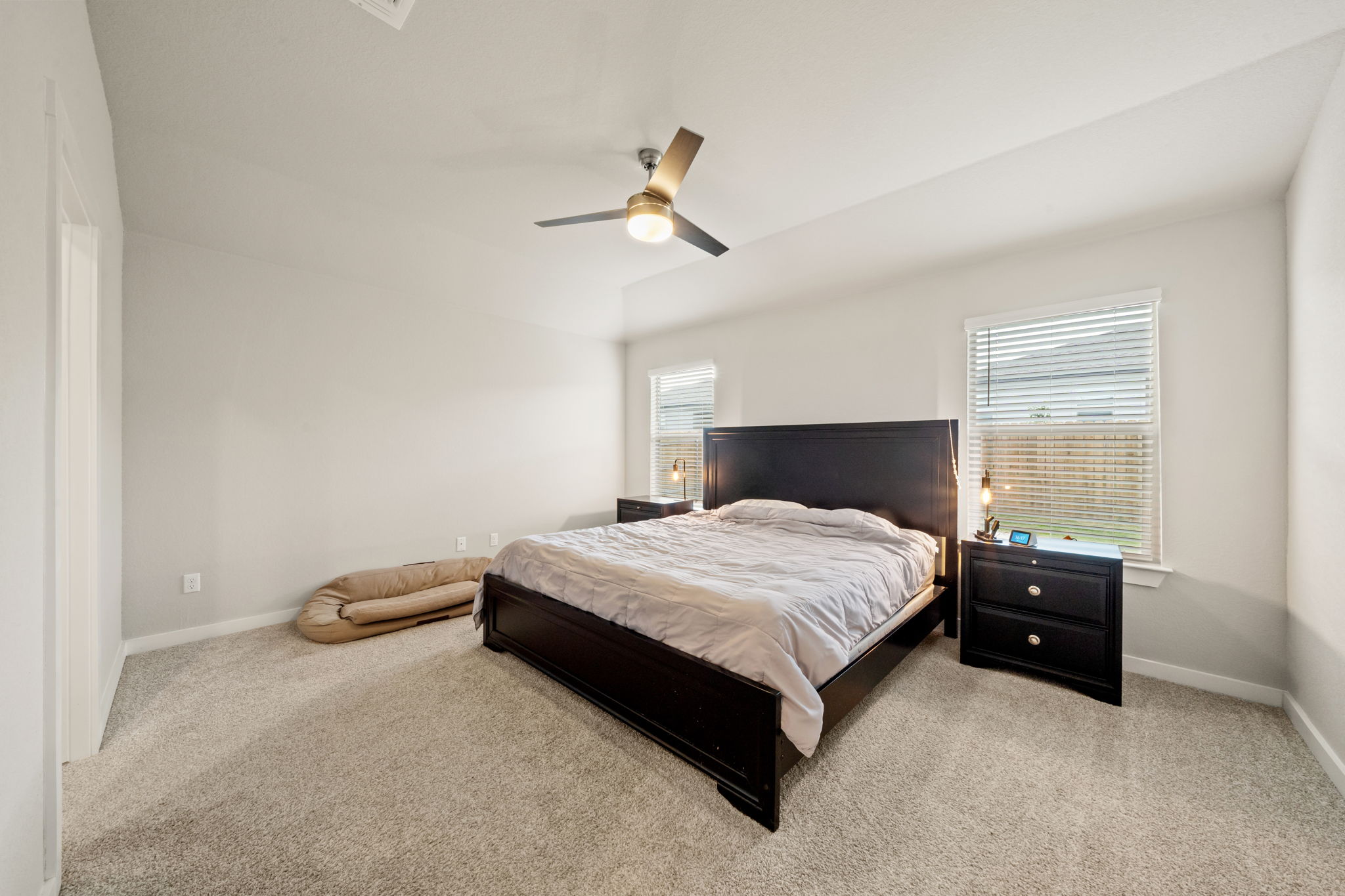 1117 Tipton Street Georgetown, TX 78633 - Photo 17 of 40 Carpeted room featuring light-colored walls and a ceiling fan with integrated lighting