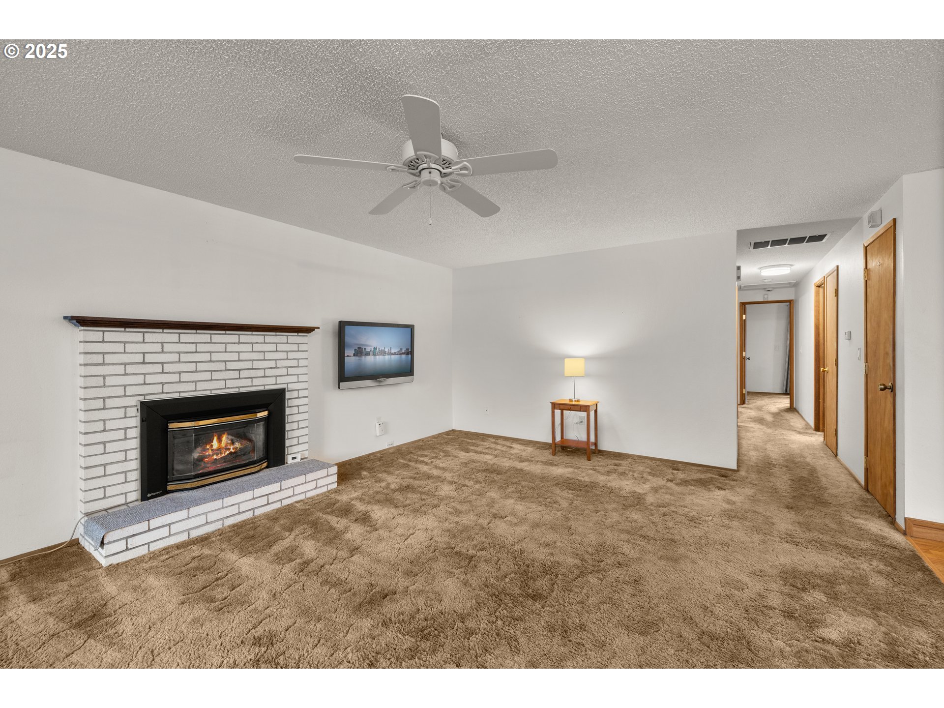 615 Cedar Street Fairview, OR 97024 - Photo 2 of 33 a view of empty room with a fireplace