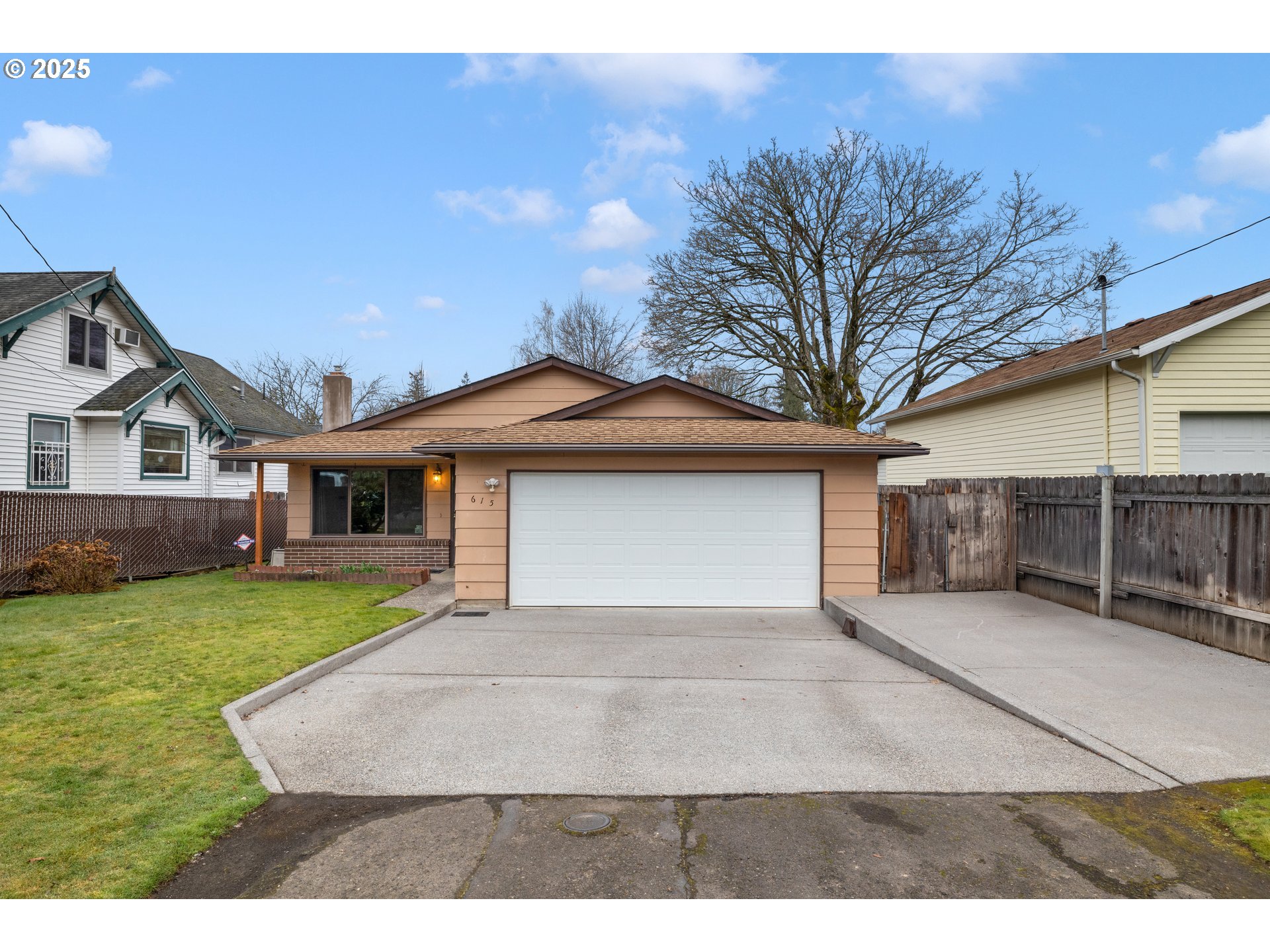 615 Cedar Street Fairview, OR 97024 - Photo 32 of 33 a front view of a house with a yard and garage