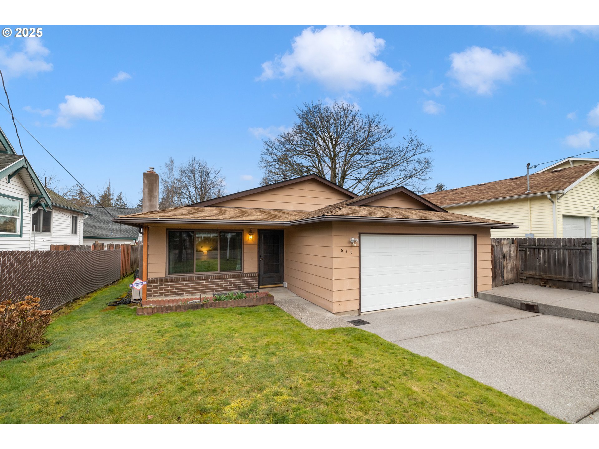 615 Cedar Street Fairview, OR 97024 - Photo 33 of 33 a front view of a house with a garden and yard