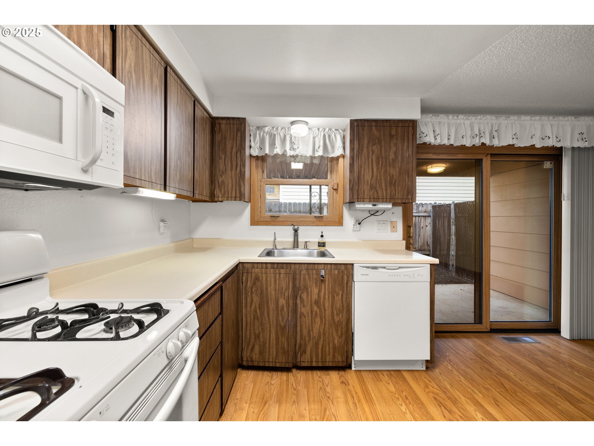 615 Cedar Street Fairview, OR 97024 - Photo 6 of 33 a kitchen with a stove and a sink