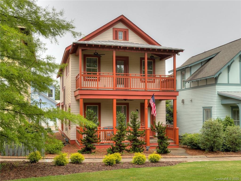 209 Coneflower Place Fort Mill, SC 29708 - Photo 2 of 48 a front view of a house with garden