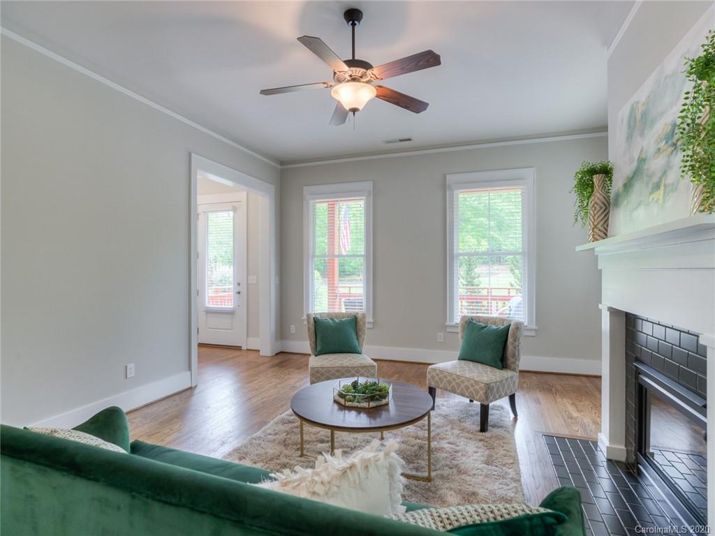 209 Coneflower Place Fort Mill, SC 29708 - Photo 11 of 48 a living room with furniture and a fireplace