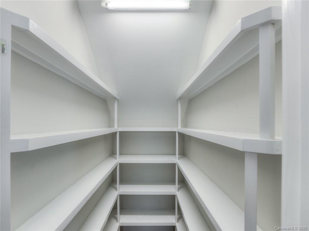 209 Coneflower Place Fort Mill, SC 29708 - Photo 25 of 48 a view of walk in closet with empty racks