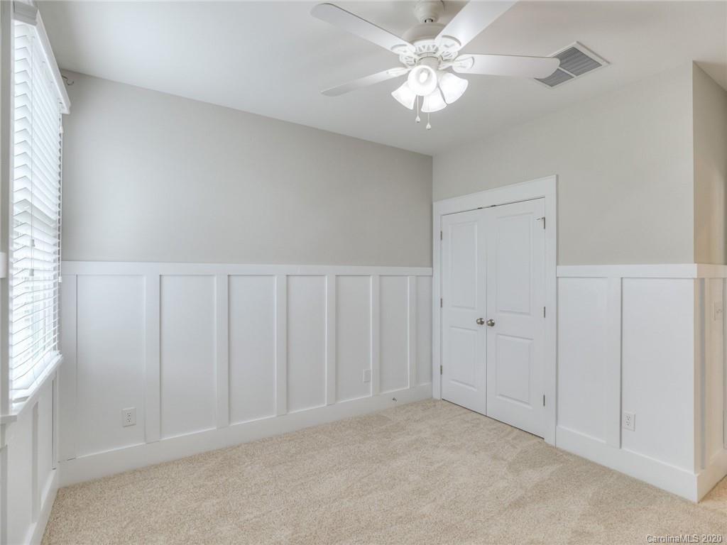 209 Coneflower Place Fort Mill, SC 29708 - Photo 33 of 48 a view of an empty room with a window