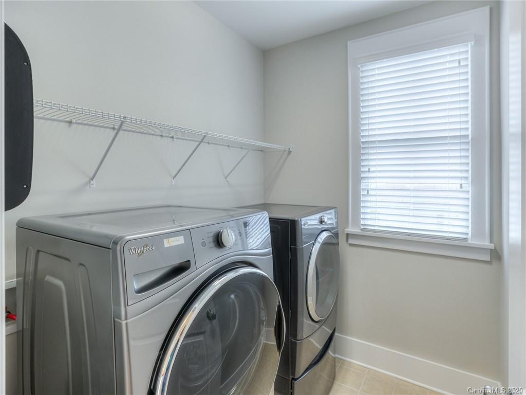 209 Coneflower Place Fort Mill, SC 29708 - Photo 36 of 48 a utility room with dryer and washer