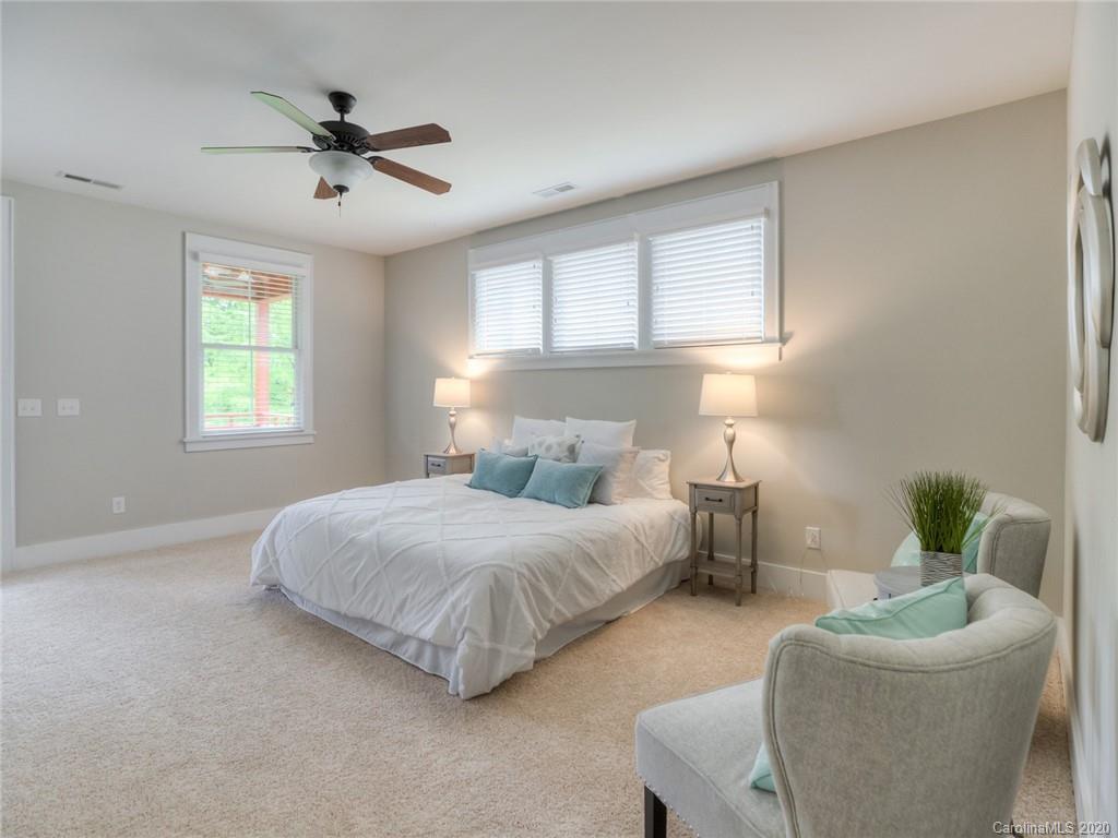 209 Coneflower Place Fort Mill, SC 29708 - Photo 37 of 48 a bedroom with bed and window
