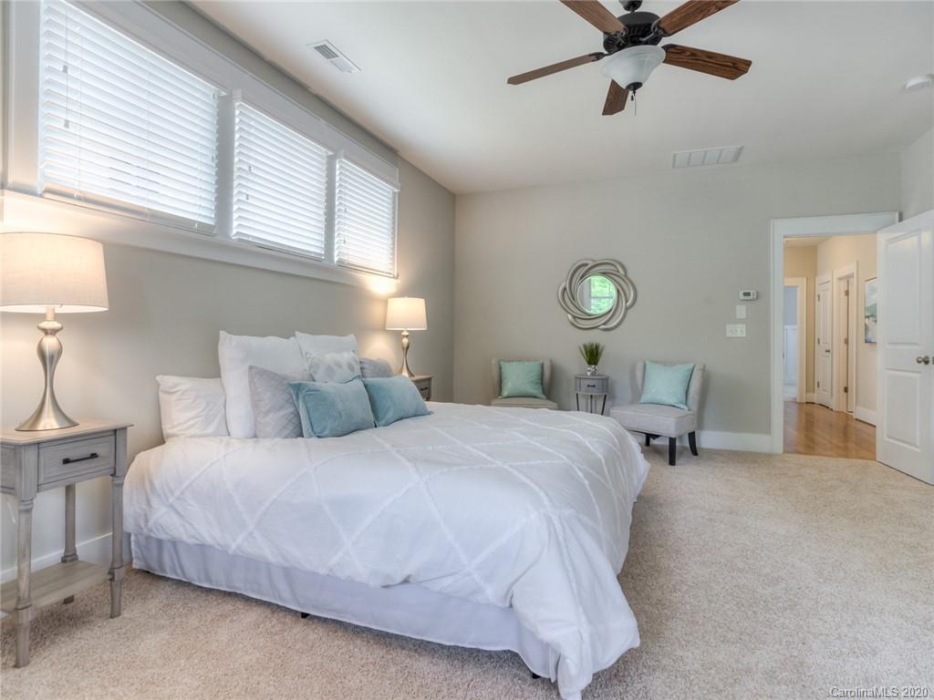 209 Coneflower Place Fort Mill, SC 29708 - Photo 38 of 48 a bedroom with bed and window
