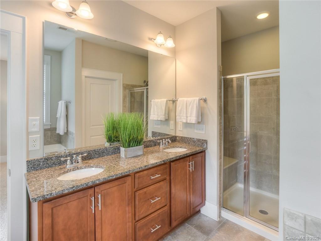 209 Coneflower Place Fort Mill, SC 29708 - Photo 40 of 48 a bathroom with a granite countertop sink and a mirror